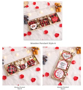 Close-up of Valentine's wooden heart ornaments with red buffalo plaid and white beads