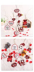Close-up of wooden Valentine's Day heart and letter ornaments on white faux fur background