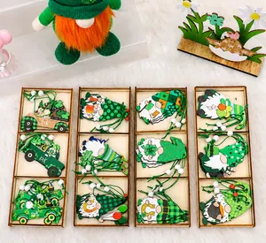 Detail of wooden St. Patrick's Day gnomes with green shamrocks and Luck text hanging ornaments