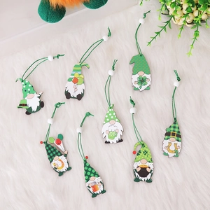 Set of 9 Saint Patrick's Day wooden gnome ornaments with clovers and green beads