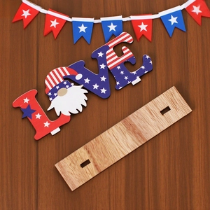 Independence Day wooden LOVE gnome sign with American flag colors on a rustic background