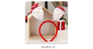 Detail of red plush Christmas gnome headband with spring forest man figures and snowflake hat
