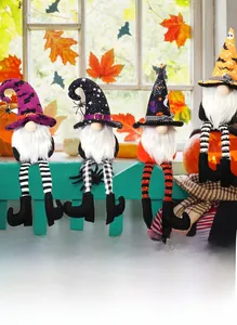 Set of 4 plush Halloween gnomes with long legs and wizard hats on a cozy window sill