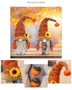 Detail view of autumn harvest gnomes with knit orange hats and sunflower accents