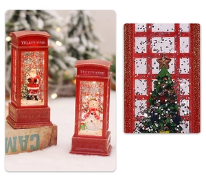 Detail of red Christmas telephone booth with Santa Claus, snow globe effect, and warm LED light