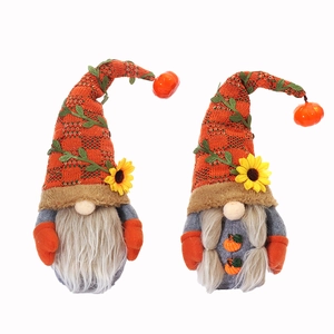 Handmade harvest festival gnomes with knitted hats, sunflowers, and mini pumpkins set