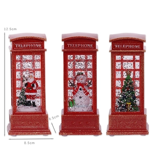 Three red Christmas telephone booth lanterns with Santa, snowman and tree scenes inside
