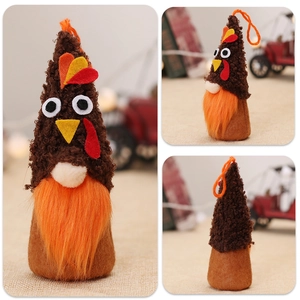 Detailed views of a lighted turkey gnome plush with orange beard for Thanksgiving decor