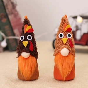Pair of Thanksgiving turkey gnome plush ornaments with lights and festive forest design