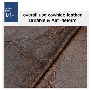 Close-up of natural grain texture on durable brown genuine cowhide leather bag