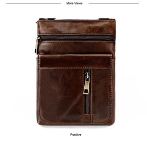Detailed close-up of dark brown leather crossbody bag with multiple zippered pockets