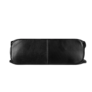 Detail view showing pebbled leather texture and reinforced bottom stitching of the handbag
