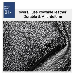 Close-up of durable black cowhide leather featuring natural lychee grain texture