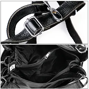 Detail view of adjustable strap with silver hardware and interior pocket of black leather bag