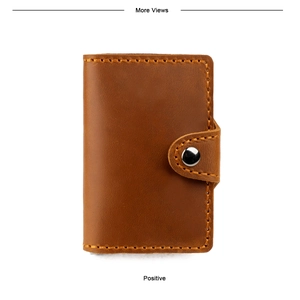 Detail of brown crazy horse leather card holder with orange stitching and silver snap button