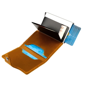Detail view of brown crazy horse leather wallet with silver aluminum pop-up card holder