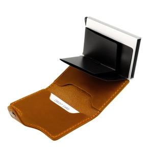 Close-up of brown crazy horse leather wallet with automatic silver aluminum card ejector