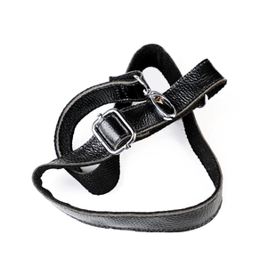 Adjustable black leather shoulder strap with silver metal buckles for handbags