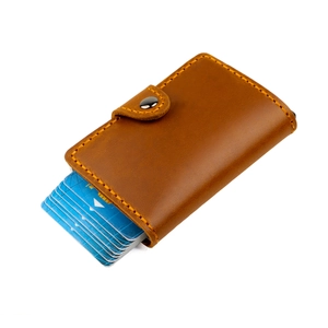 Vintage brown crazy horse leather pop-up card holder with manual stitching and snap closure
