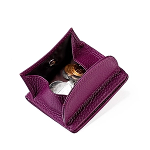Detail of purple genuine leather coin purse with silver snap closure and wide opening
