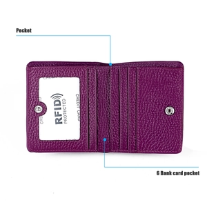 Detail view of purple leather wallet interior featuring six card slots and RFID protection
