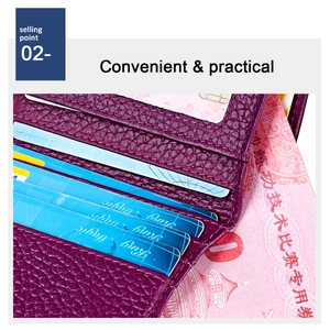 Detail of purple litchi leather wallet showing multi-card slots and bill compartment