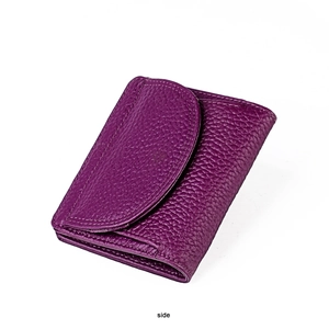 Detail view of purple lychee pattern leather mini wallet with contrast stitching