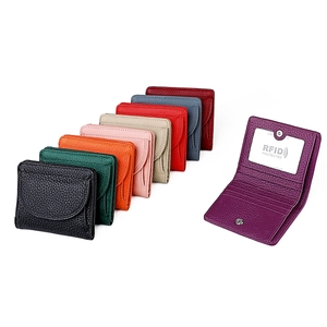 Mini RFID leather wallets in multiple colors with pebbled texture and card slots