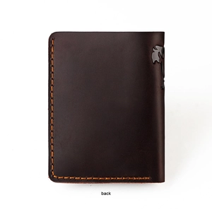 Close-up of vintage crazy horse leather wallet back with orange stitching and logo