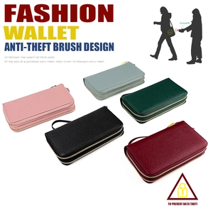 Detailed view of five RFID blocking long wallets in textured leather with dual zippers