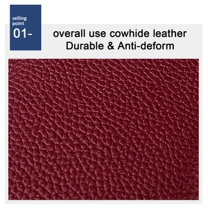 Close-up of wine red lychee pattern cowhide leather with durable and anti-deform texture
