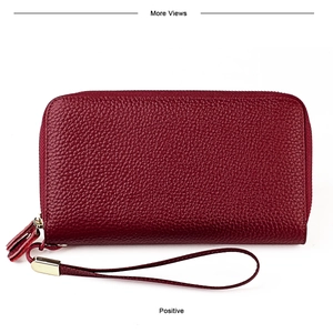 Detailed front view of deep red litchi grain leather wallet with wrist strap