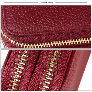Close-up of premium red pebble grain leather texture and durable golden metal zipper details