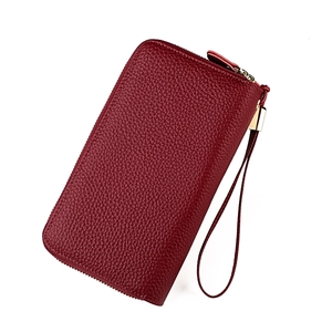Deep red RFID leather wallet for women featuring litchi grain texture and gold zippers
