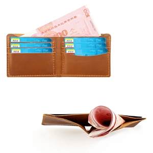 Detail of vintage crazy horse leather wallet with six card slots and cash pocket