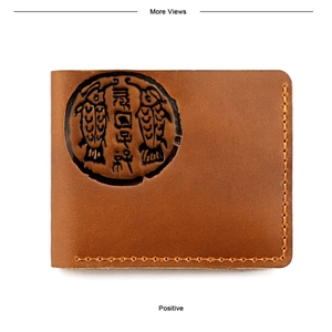 Detail of vintage brown crazy horse leather wallet with embossed fish emblem and stitching