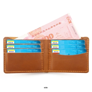 Detail view of leather wallet interior with six card slots and contrast stitching