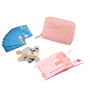 Pink leather card holder wallet showing storage capacity with cards and coins