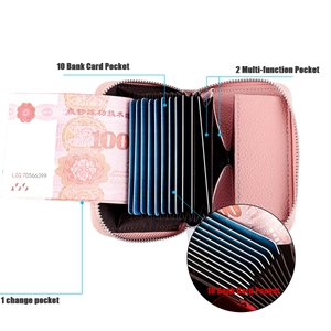 Pink lychee texture leather card wallet featuring accordion style slots and metal zipper