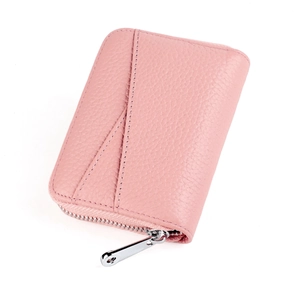 Close-up of pink litchi grain leather card holder with silver zipper and side card slot