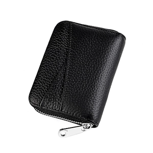 Detail of premium lychee grain leather card holder with silver zipper closure