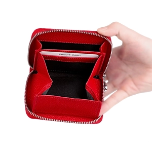 Internal view of red pebble leather coin purse with accordion divider and credit card slot