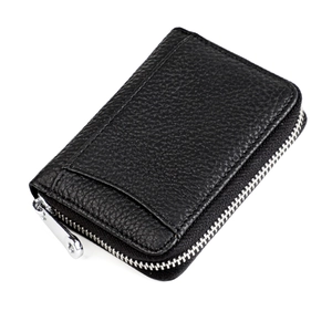 Detail of premium black pebble grain leather wallet with a smooth silver metal zipper