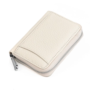 Detail of off-white lychee grain leather wallet featuring RFID blocking and card slot