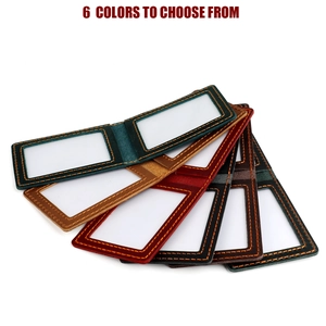 Detail view of leather driving license holders in six vintage colors with precise stitching