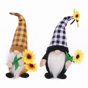 Pair of harvest festival gnomes with sunflower accents and classic plaid pattern hats