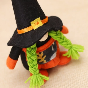 Halloween witch gnome plush doll with orange braids and pointed hat for holiday decor