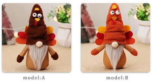 Detail view of two Thanksgiving turkey gnomes in dark brown and orange plush finishes