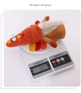 Detailed weight display of a Thanksgiving turkey gnome plush toy on an electronic scale