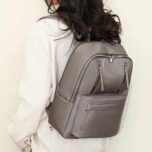Women's dark gray nylon backpack for travel with multi-functional zipper pockets